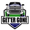 A logo for the company Geter Gone which provides hotshot and transport services. It consists of the front of a powerful looking RAM truck breaking the confines of a sheild like shape 